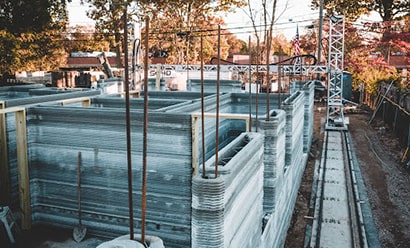 Vertical rebar in a halfway completed 3D printed house